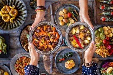 Meat stew with vegetables. Orman kebab . Cooked foods in the copper plate or pot. 