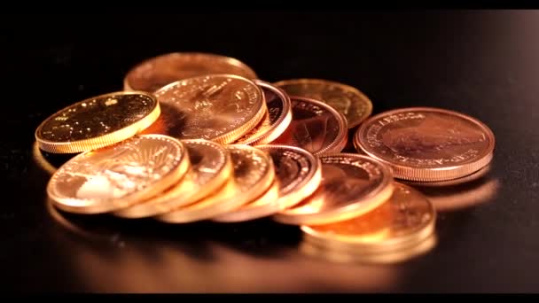 Different Gold Coins Lie Unsorted Next Each Other — Stock Video