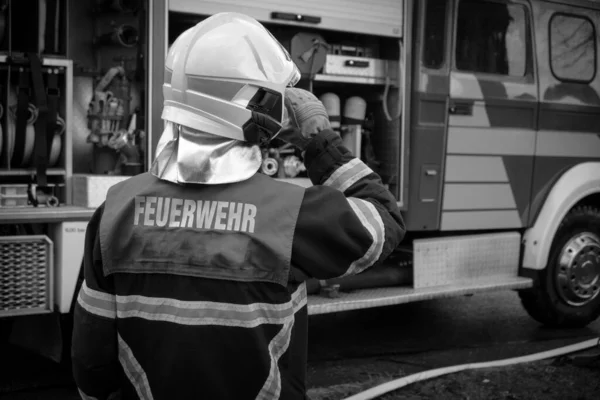 Firefighter Stands Front His Fire Truck — Stock Photo, Image