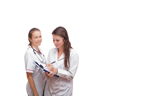 Potret dua perawat pada latar belakang putih — Stok Foto