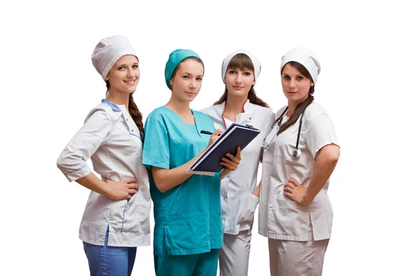Portret groep van verpleegsters tegen witte achtergrond — Stockfoto