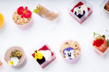 Sweet snacks in clear glasses for events. Catering. 