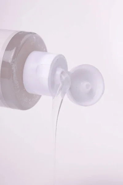 Transparent gel from a transparent tube. Cream advertisement. 스톡 사진