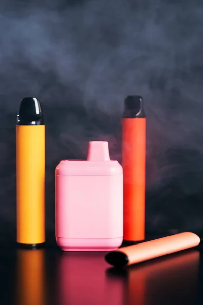 Set Colorful Disposable Electronic Cigarettes Different Shapes Black Background Smoke — Foto de Stock