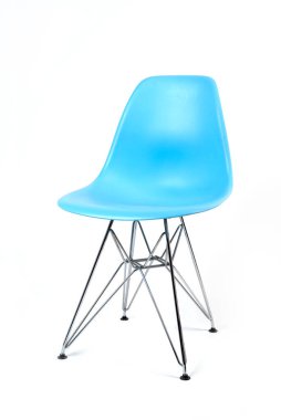 Blue color chair, modern designer. Chair isolated on white background. Kitchen or home furniture with iron legs.