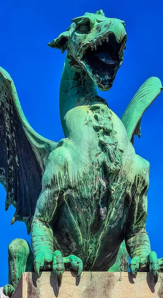 Slovenia, Ljubljana - September 28, 2021:  Bronze dragon on the dragon bridge, Ljubljana.