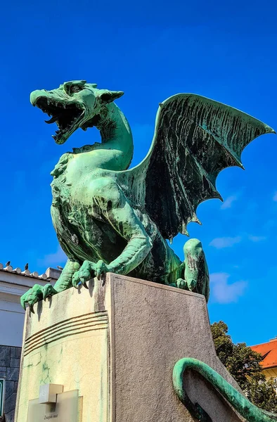 Ljubljana, Slovenia - September 28, 2021:  Bronze dragon on the dragon bridge, Ljubljana.