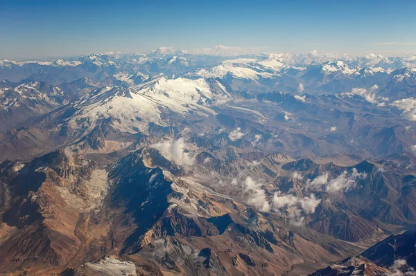 Andes Mountains (Cordillera de los Andes) viewed from an airplane window, near Santiago, Chile.