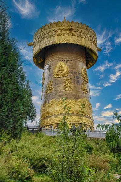 Shangri-La Golden temple or Dafo temple With giant Spinning Golden Wheel at Dukezong old town, located in Zhongdian city ( Shangri-La). Zhongdian