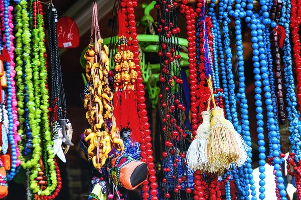 Colorful handmade beads at Lijiang Old Town in China by selective focus