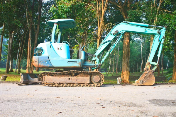 Baumaschinen mit Hacken — Stockfoto