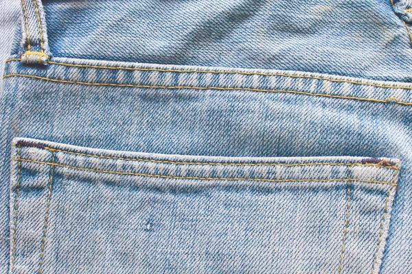 Old blue jeans pocket — Stock Photo, Image