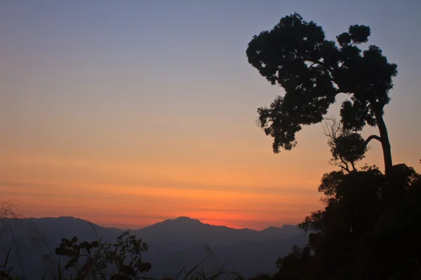 Sunset on mountain background — Stock Photo, Image