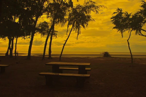 stone  bench with sea background