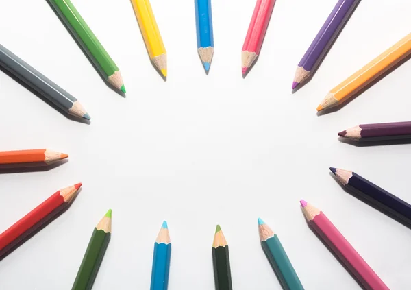 Close up of color pencils with different color over white backgr — Stock Photo, Image