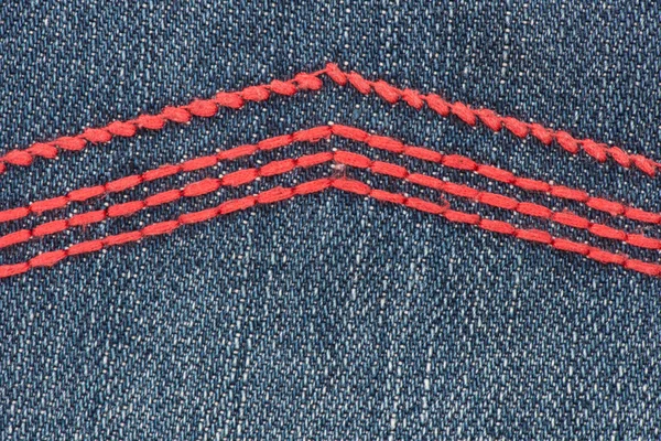 Textura Jean de algodón con las flechas rojas —  Fotos de Stock