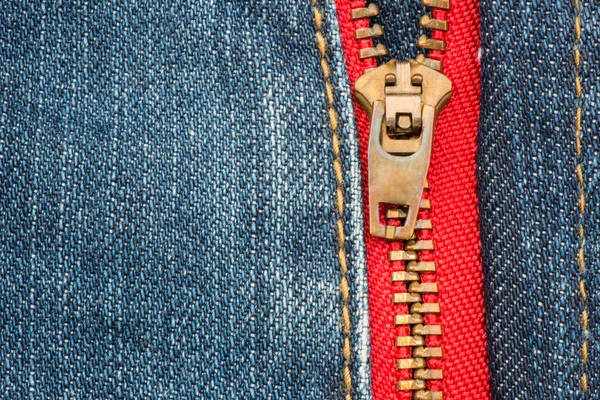 Textura Jean de algodón con cremallera roja — Foto de Stock