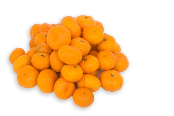 Mnoho čerstvých surovin oranžová na bílém pozadí — Stock fotografie