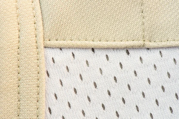 Tejido crema y textura de la costura de fondo — Foto de Stock