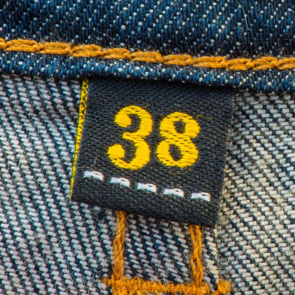 Blauwe Denim Jean en gele naad textuur achtergrond — Stockfoto
