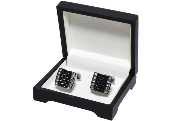 Cuff links in a case on the white — Stock Photo, Image