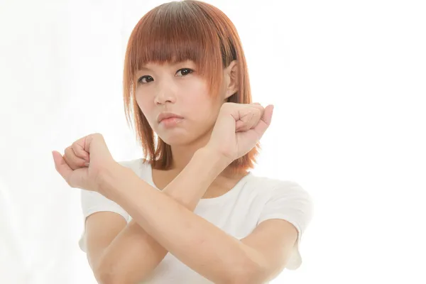 Imagen brillante de la joven mujer asiática haciendo gesto de parada —  Fotos de Stock