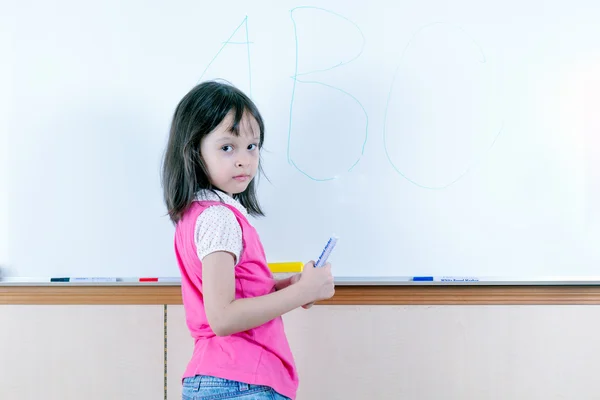 Child at whiteboard — Stock Photo, Image