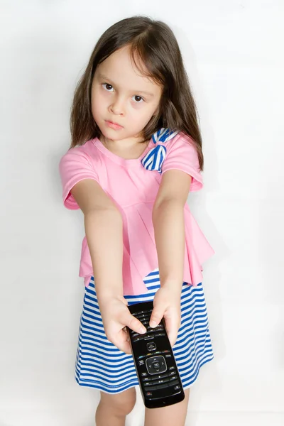 Criança com controle remoto — Fotografia de Stock
