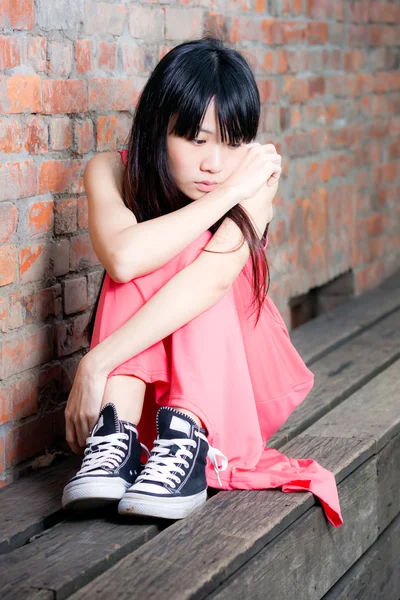 Young woman looking sad — Stock Photo, Image