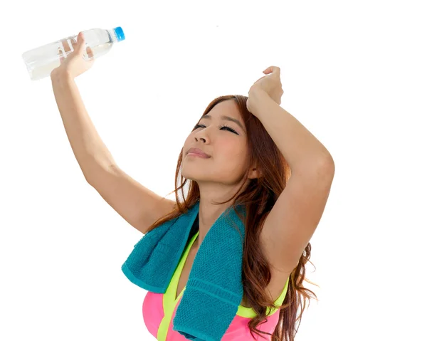 Attractive Asian woman with water bottle and towel after exercis — Stock Photo, Image