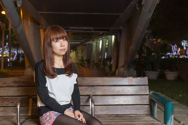 Sad Asian Woman on a Park Bench — Stock Photo, Image