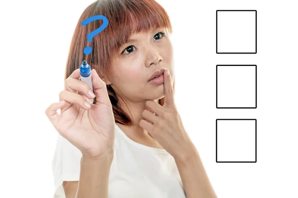 Asian woman writing question mark on imaginary board making deci — Stock Photo, Image