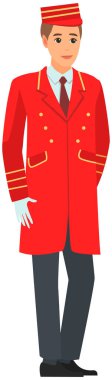 Komi olarak çalışan bir adam. İş kıyafetleri içinde bir otel çalışanı. Kapıcı, kapıcı, kırmızı üniformalı kapıcı.