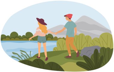 Boy and girl walking on shore of lake or river. People in love spending time together outdoor