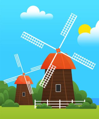 Fabrika inşaatı, çimenli çayır ve sıcak yeşillik mevsimi. Yel değirmenli kırsal bölge, köy mimarisi. Doğal gıda üretimi için değirmen. Çiftlik, ilkbaharda ekolojik tarım arazisi