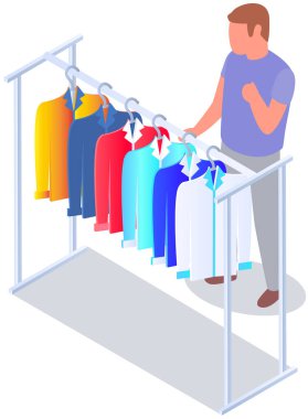 Choosing clothes in store, shopping concept. Male buyer chooses clothing in dressing room. Customer with dress hanging on hanger in mall. Man shopper stands in fitting room of store or boutique