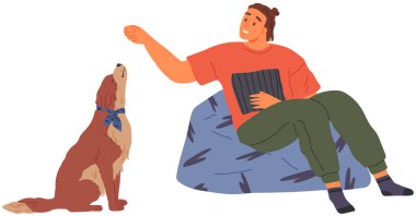 Hayvan sahibi köpekle oynuyor. Hayvanlarla ilgilenmek, evcil hayvan konseptiyle ortak zaman geçirmek. Yavru köpeği olan mutlu bir adam. Evcil hayvan arkadaşı. Erkek karakter eğitmeni köpek. İnsan köpekle vakit geçirir.