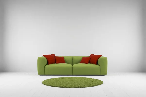 Divano verde con moquette — Foto Stock