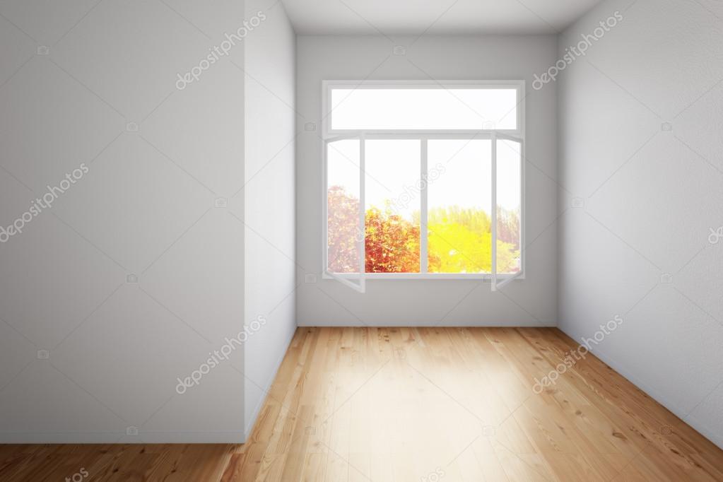 Empty room with hardwood floor
