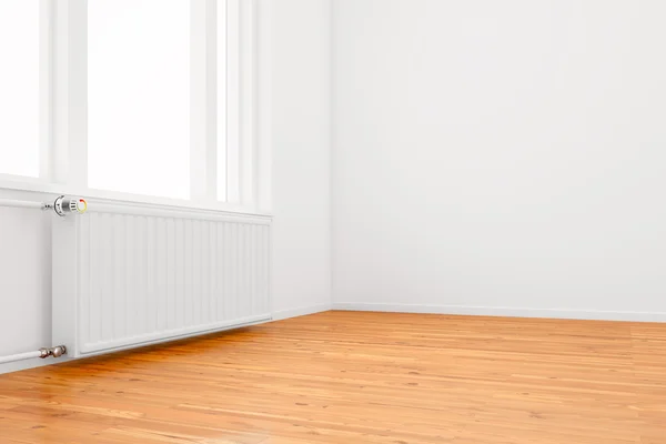 Radiator in empty room — Stock Photo, Image