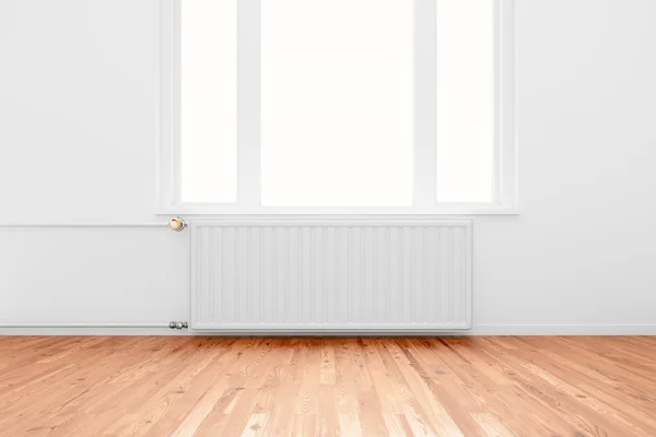 Radiator in empty room — Stock Photo, Image