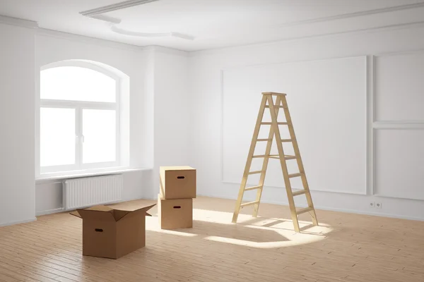 Порожня кімната зі сходами і коробками — стокове фото