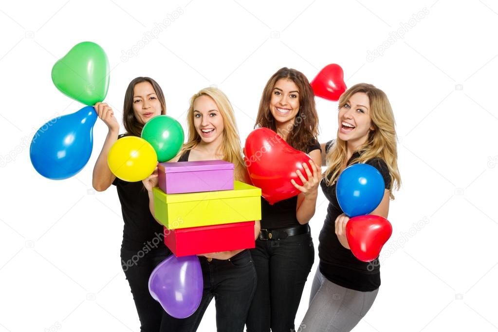 Girls having a party with baloons and boxes