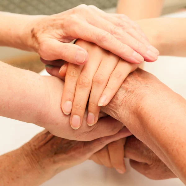 Stack of old and young hands — Stock Photo, Image