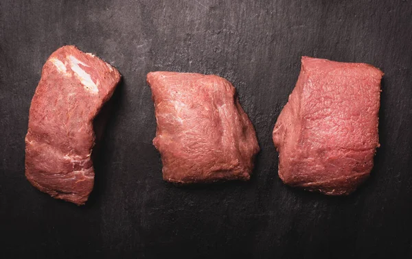 Raw Game Meat Beef Top View Three Pieces Meat Black —  Fotos de Stock