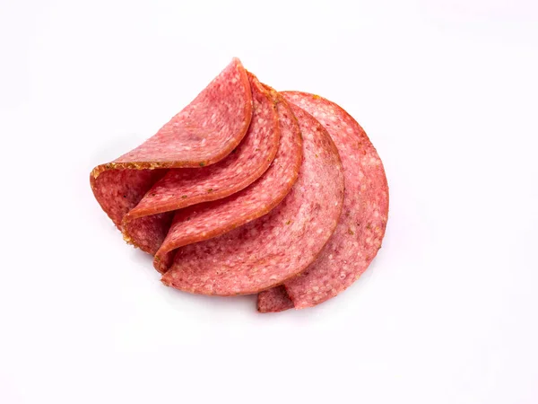 Few Salami Slices Isolated Close Meat Cold Cuts White Background — Foto Stock