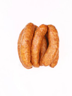 Country style smoked sausage in rings, isolated on a white background. Traditional Polish meat sausage with natural garlic aroma, a packshot photo for package design, template.