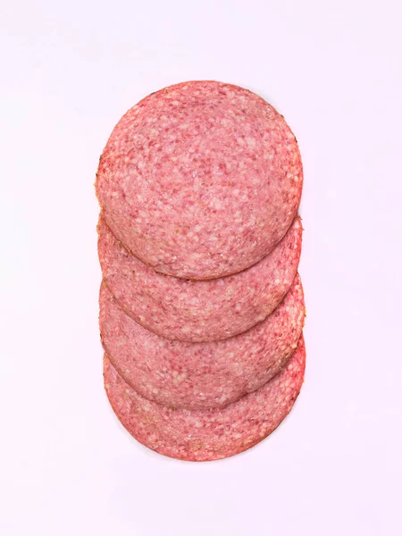 Few Salami Slices Isolated Close Top View Meat Cold Cuts — Fotografia de Stock