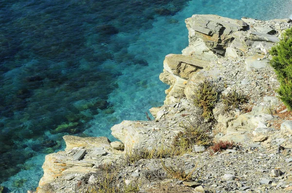 Stenar på stranden i stintino — Stockfoto