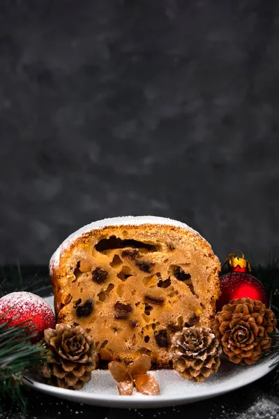 Christmas Fruitcake Powdered Sugar White Plate Dark Background Seasonal Decorations — Stock Photo, Image